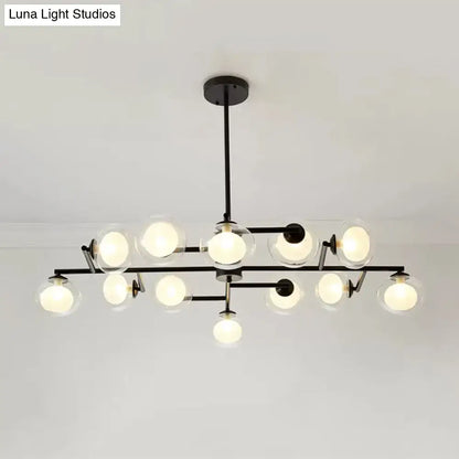 Modern black metal chandelier with clear glass globe bulbs from DecorBites™ black white oval island light suspension