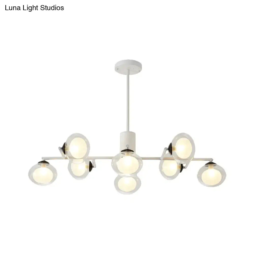Modern black white DecorBites™ oval shade island light with 8 frosted glass globe bulbs in a symmetrical design