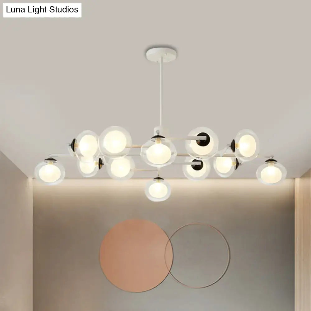 Modern white chandelier with multiple spherical glass globes and black accents in decorbites™ black white island light