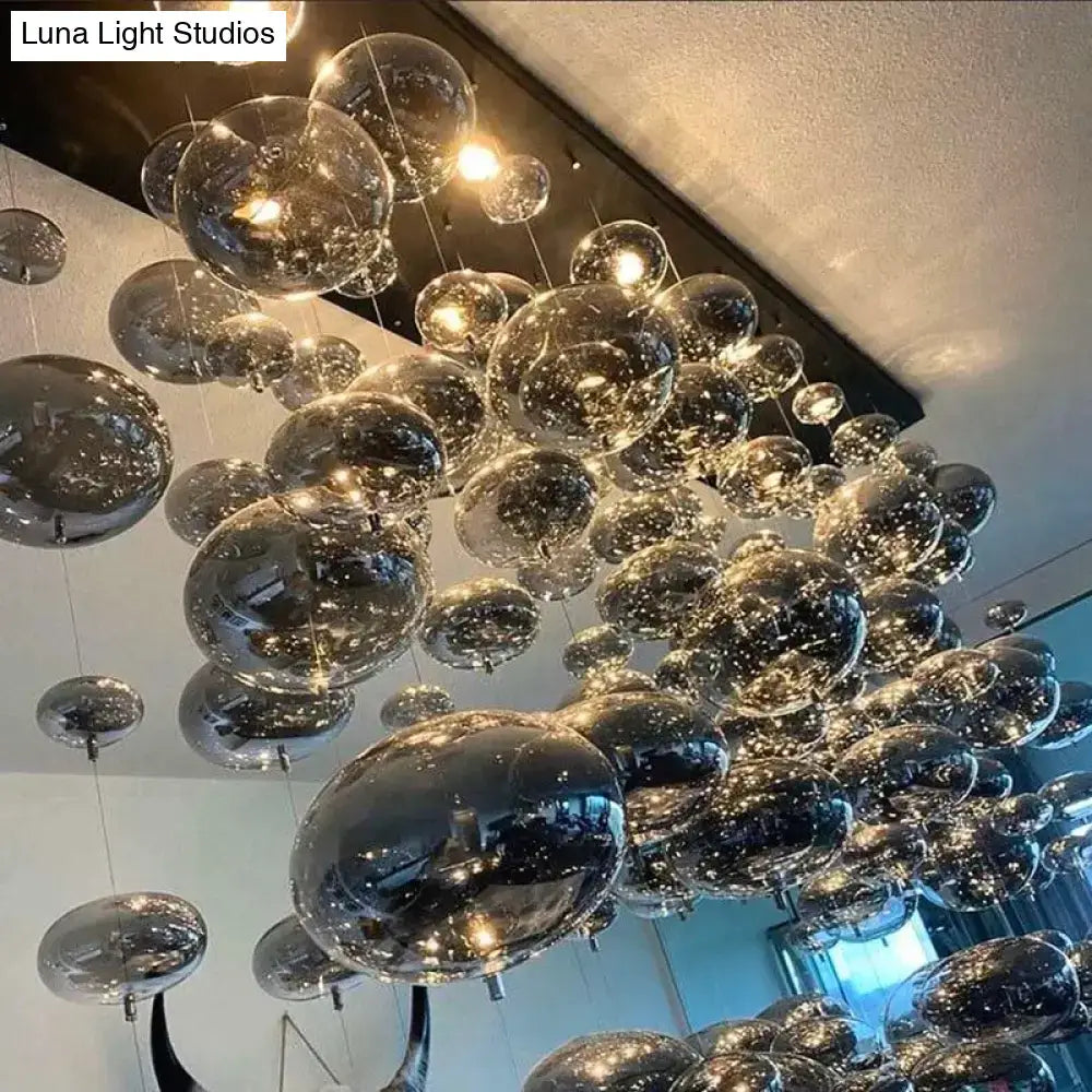 DecorBites modern oval bubble ball LED chandelier with transparent glass spheres for dining room lighting fixture