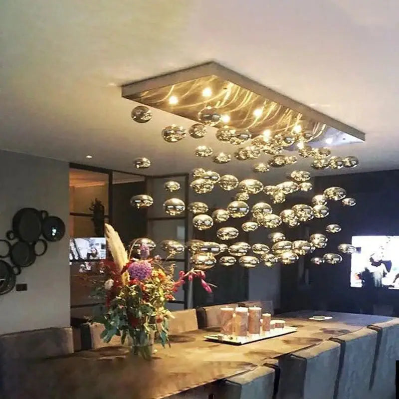 Decorbites modern oval bubble ball led chandelier with metallic frame and reflective glass orbs for dining room lighting