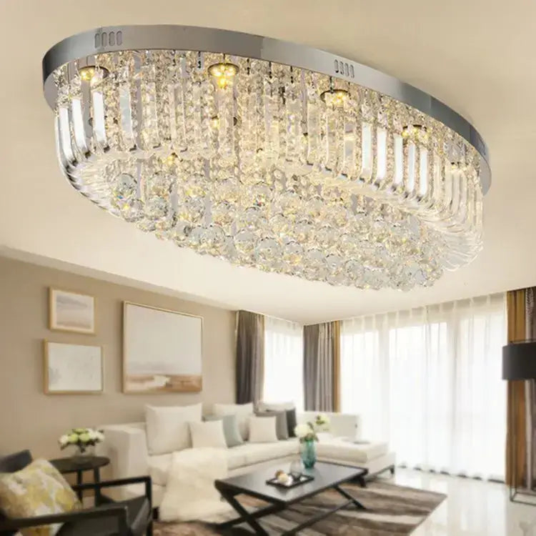 A modern oval chrome ceiling light with clear crystal prisms for dining room decorbites crystal dining use