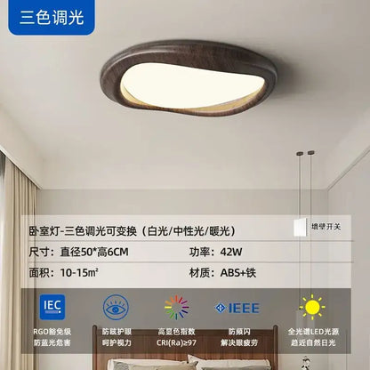 A modern oval decorbites led wood chandelier with dark wood finish and warm white led illumination for living room lighting