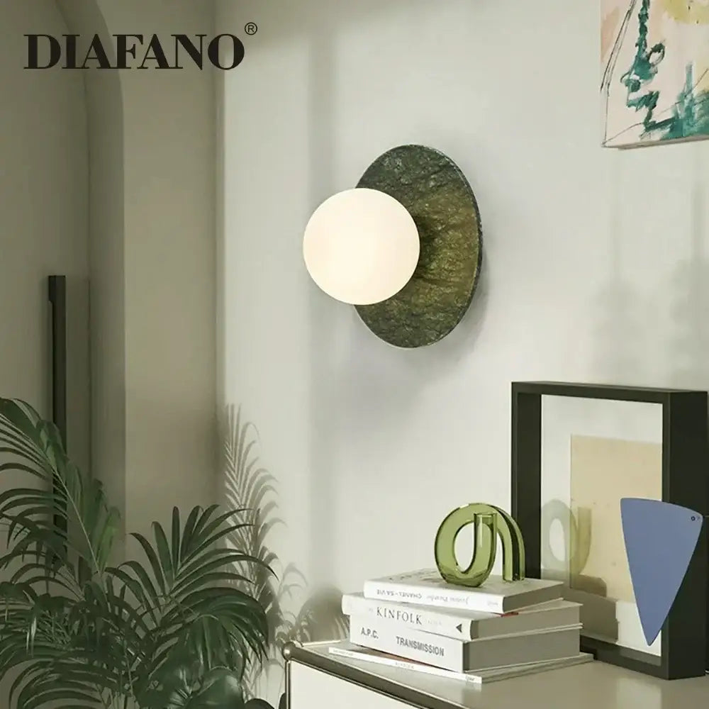 Diafano modern wall lamp with matte white spherical bulb and green marble oval base for living room decorbites green marble