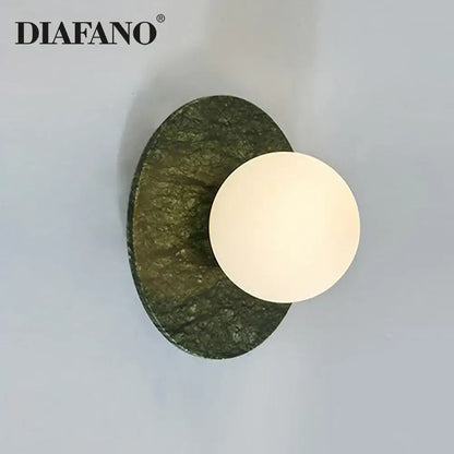 Diafano modern oval green marble wall lamp with textured stone base and white circular light fixture for living room decorbites green marble wall sconce