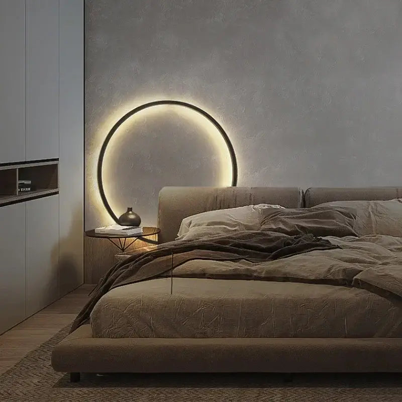 Modern oval led wall sconce with a sleek black frame and warm ambient glow by decorbites led wall for bedroom mirror light