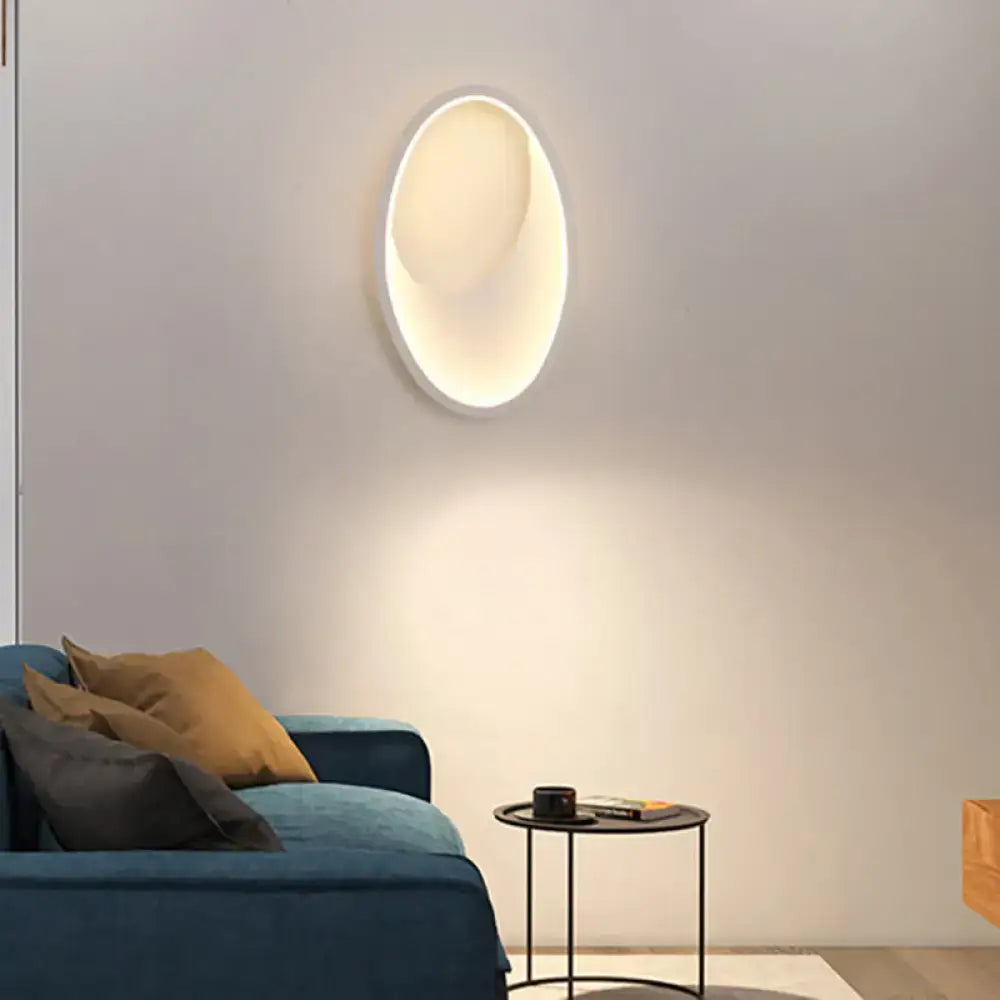 Modern oval white and black led wall lamp with sleek minimalist design and soft white illumination for 110v-120v use