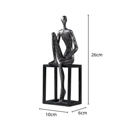 A sleek oxidized silver abstract thinkers sculpture with textured metallic finish on black cube base for decorbites decorbites abstract