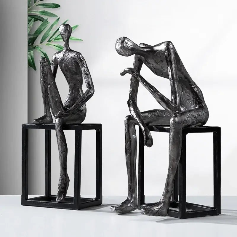 Modern oxidized silver abstract thinkers sculpture by decorbites featuring two textured metallic figurines for living room decor