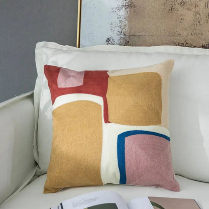 Modern pastel geometric cushion cover with embroidered red mustard yellow pink and cream fabric decorbites geometric cushion
