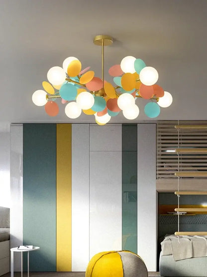 Modern pastel glass hanging ceiling lamp with gold-toned stem and colorful spherical shades for kids room decorbites glass hanging