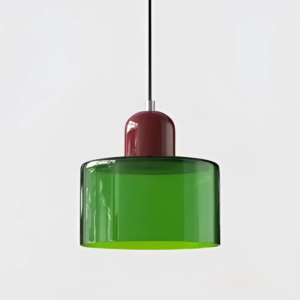 Modern pendant light with a vibrant green stained glass shade and glossy red metallic top for kitchen dining room use