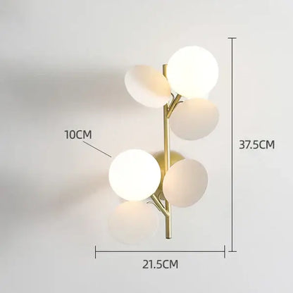 Gold-toned wall lamp with five frosted glass globe shades in branching design for decorbites colorful macaron acrylic decor