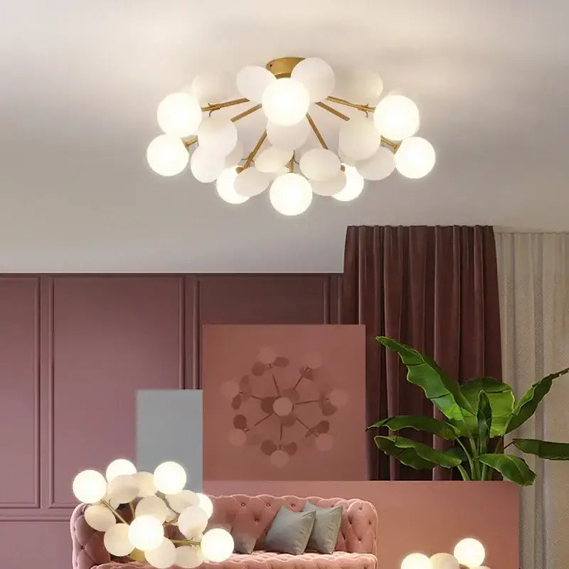 Modern pastel spherical frost glass ceiling chandelier with gold-toned frame featuring decorbites frost glass globes