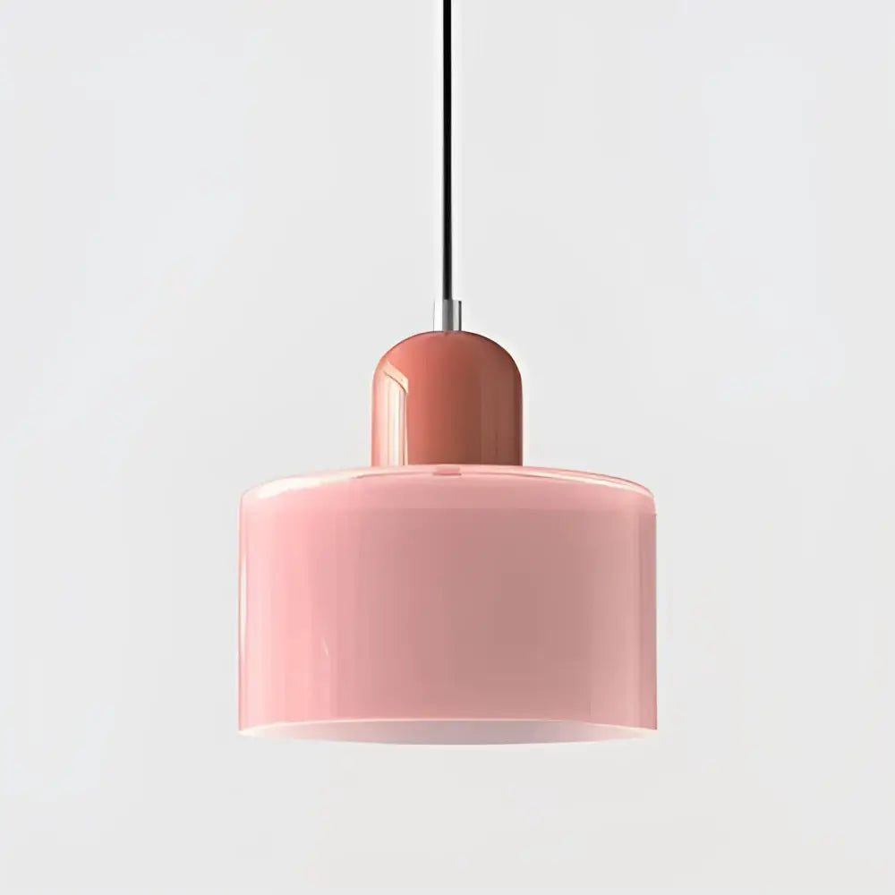 A soft pink cylindrical pendant light with matte finish and cord pendant design in modern pastel stained glass set