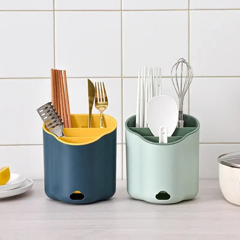 Two modern pastel plastic double layer cutlery holders with wavy design and contrasting yellow and green interiors