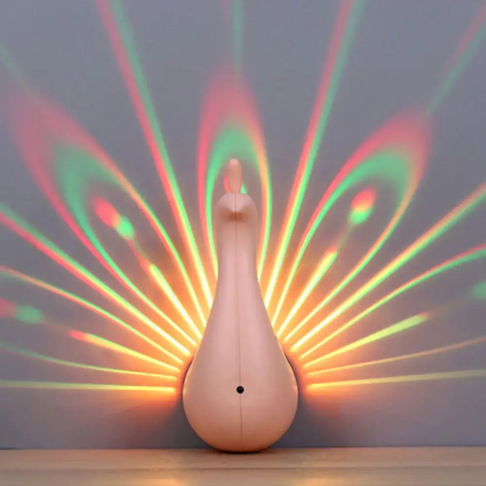 Modern peach peacock wall sconce with glossy finish projecting vibrant rainbow patterns for bedroom lighting