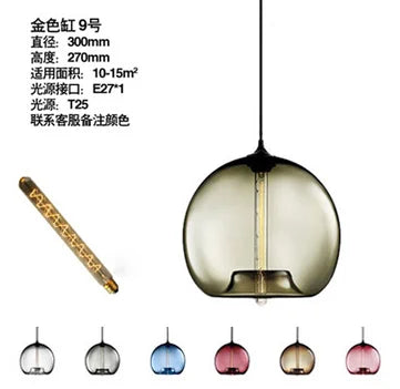 Modern pendant light with amber tinted spherical glass shade suspended by black cord for bedroom dining bar decor