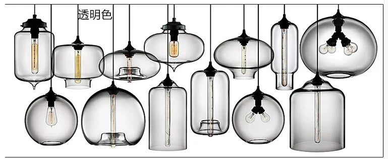 Transparent glass modern pendant lights with black metal fixtures and exposed filament bulbs for bedroom and dining room