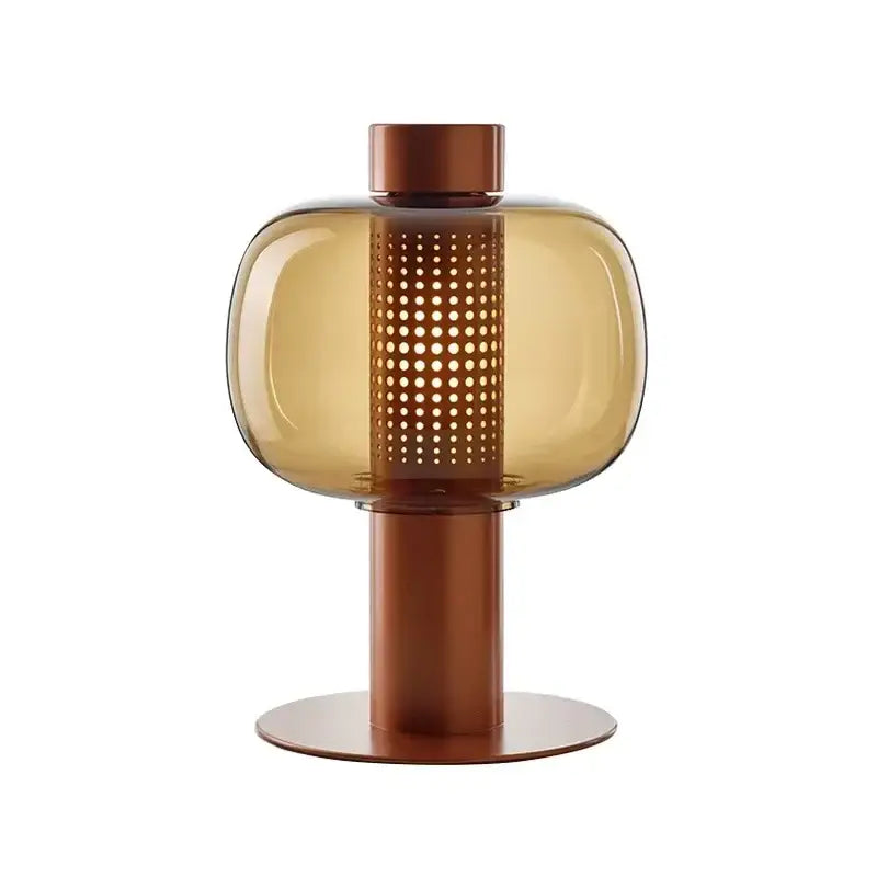 A sleek amber glass table lamp with perforated column and copper metal base for bedroom and living room decorbites glass table lamp