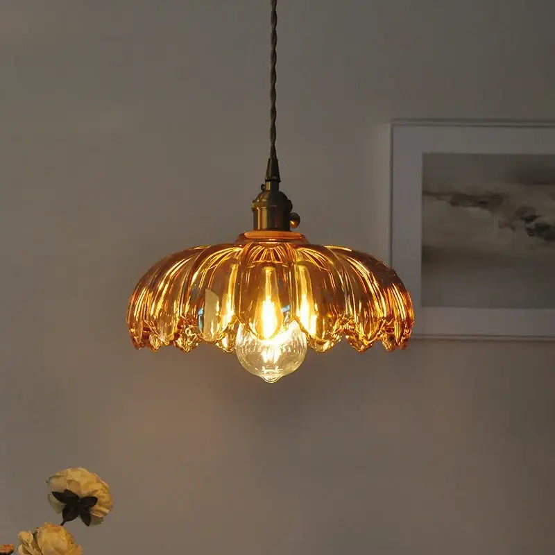 Modern petal amber glass led pendant lamp with brass fixture and twisted black cord for dining room lighting