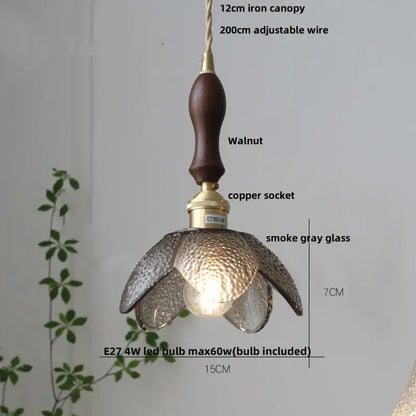 Modern petal clear glass led pendant lamp with smoke gray glass petals, walnut iron canopy, and brass copper socket perfect for dining room decorbites clear glass design