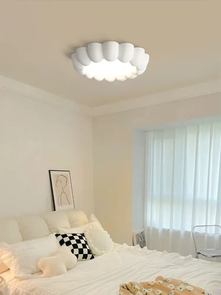 Modern petal cream wind ceiling lights featuring a white cloud-shaped design with a soft glow for cream wind bedroom decorbites