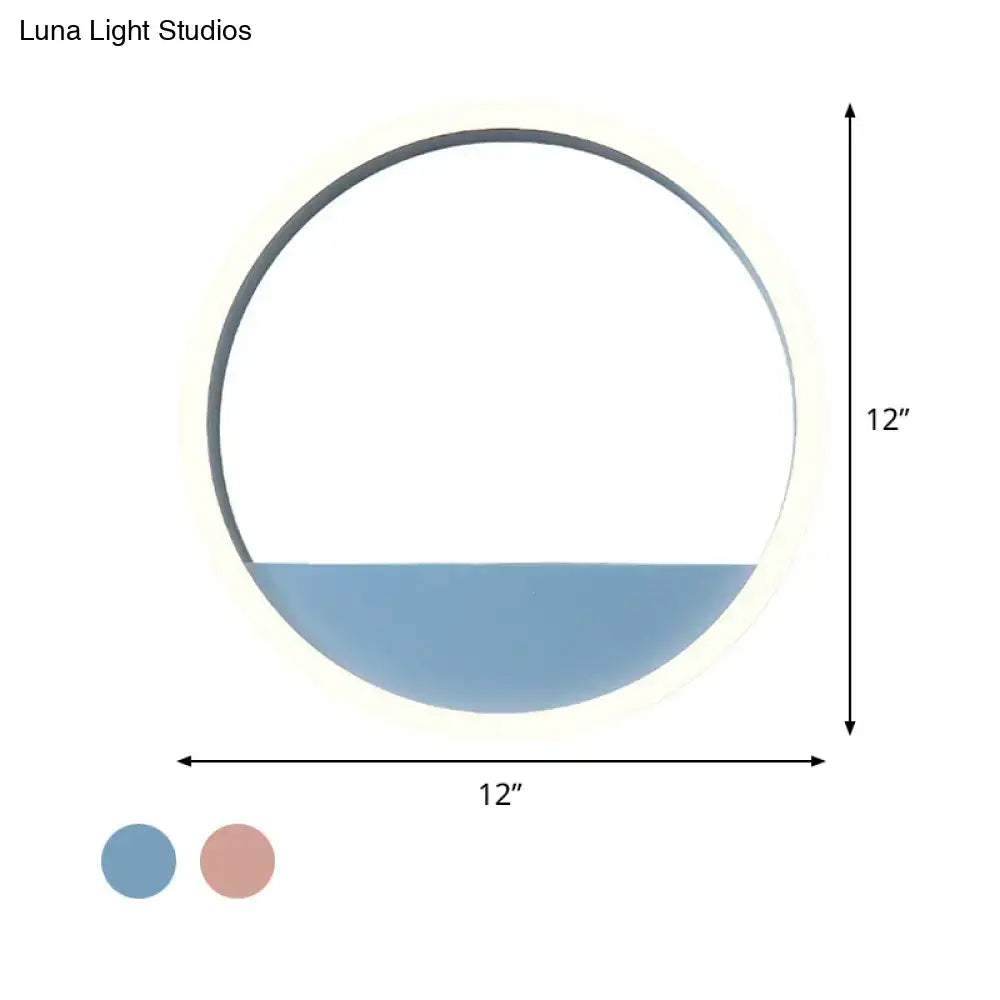 Modern pink blue iron hoop wall light with circular 12-inch led sconce, matte frame, and softly glowing blue diffuser