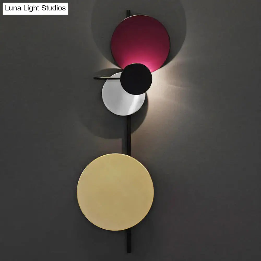 Modern pink silver and gold circular wall mount light with three stacked discs in matte finish for living room wall mount light