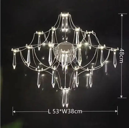 Modern polished steel pendant light with symmetrical multi-tiered crystal prisms and slender steel finish arms for dining room