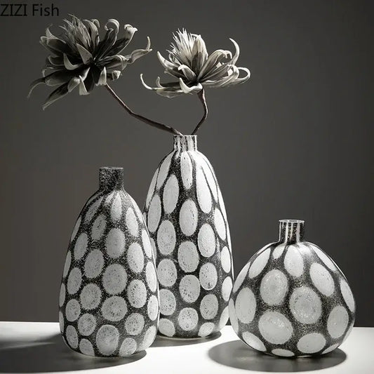 Three modern black and white decorbites bubble glass vases with polka dot textured surfaces for living room decor