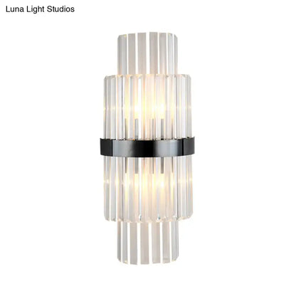 Modern prism black wall mount lamp with stacked clear glass rods and sleek black color perfect as a wall lamp