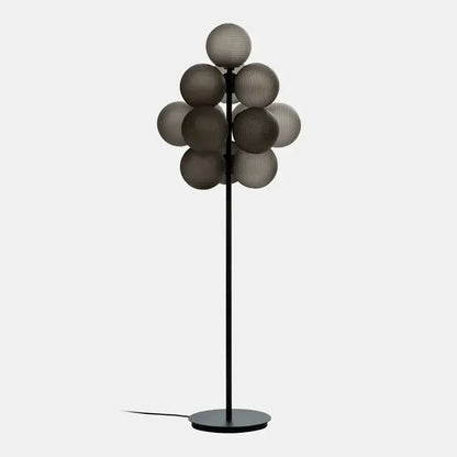 Modern purple decorbites glass bubble floor lamp with slender black metal stand and gray glass bubble shades for living room
