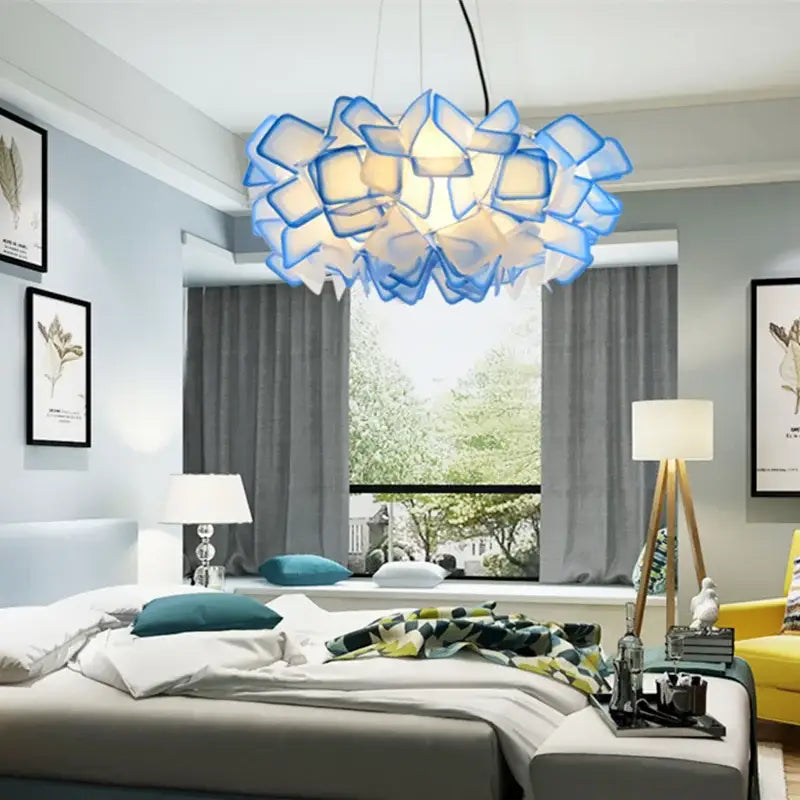Modern purple and yellow petal led chandelier bedroom pendant light featuring a blue and white layered fabric decorbites clizia led design