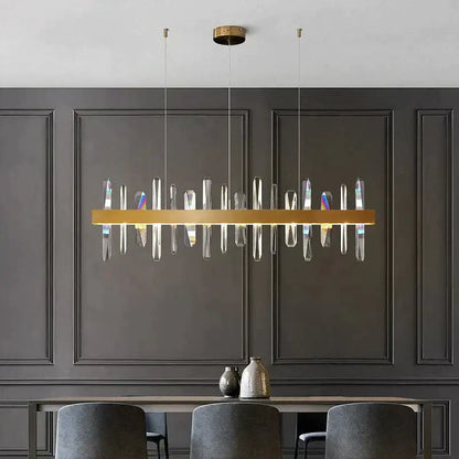 Modern rectangle gold crystal chandelier with clear prisms in a linear design by DecorBites™ Kyala collection