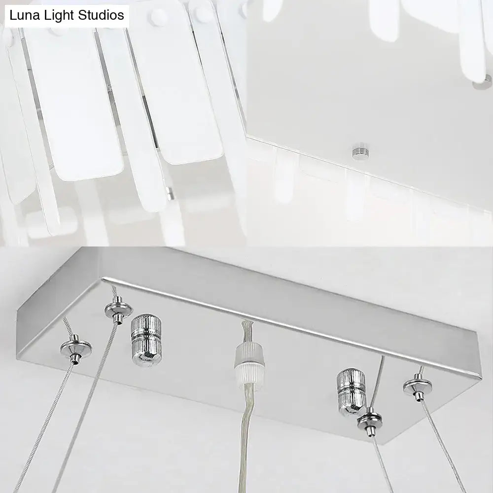 Modern white rectangular DecorBites™ adjustable acrylic LED island pendant light with chrome finish and hanging cord
