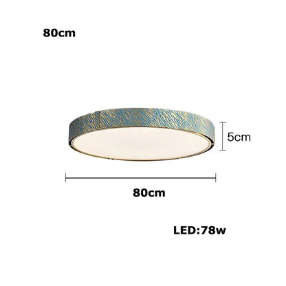 Modern rectangular blue copper crystal led chandelier with circular textured zebra-striped blue and silver ceiling light rim