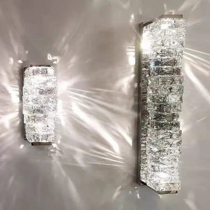Modern rectangular crystal wall sconce with clear faceted blocks and sleek metallic frame for bedroom decorbites crystal wall lighting