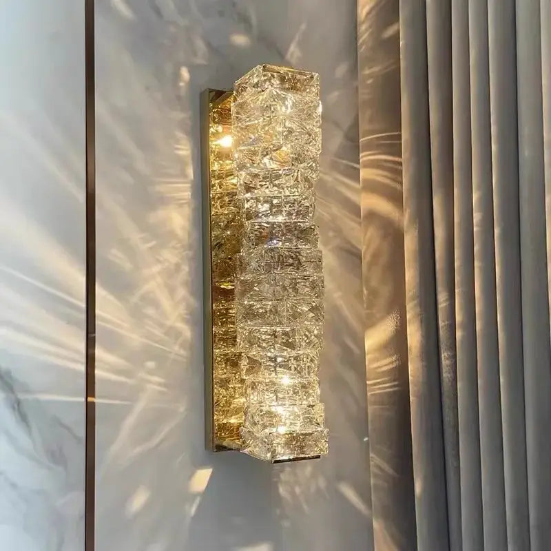Modern rectangular crystal wall sconce with stacked faceted crystal design and gold-toned metal backing for bedroom decorbites crystal wall light fixture