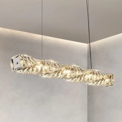 Modern rectangular elegant crystal pendant light with textured mountain design and warm led lighting for dining room decorbites elegant crystal pendant
