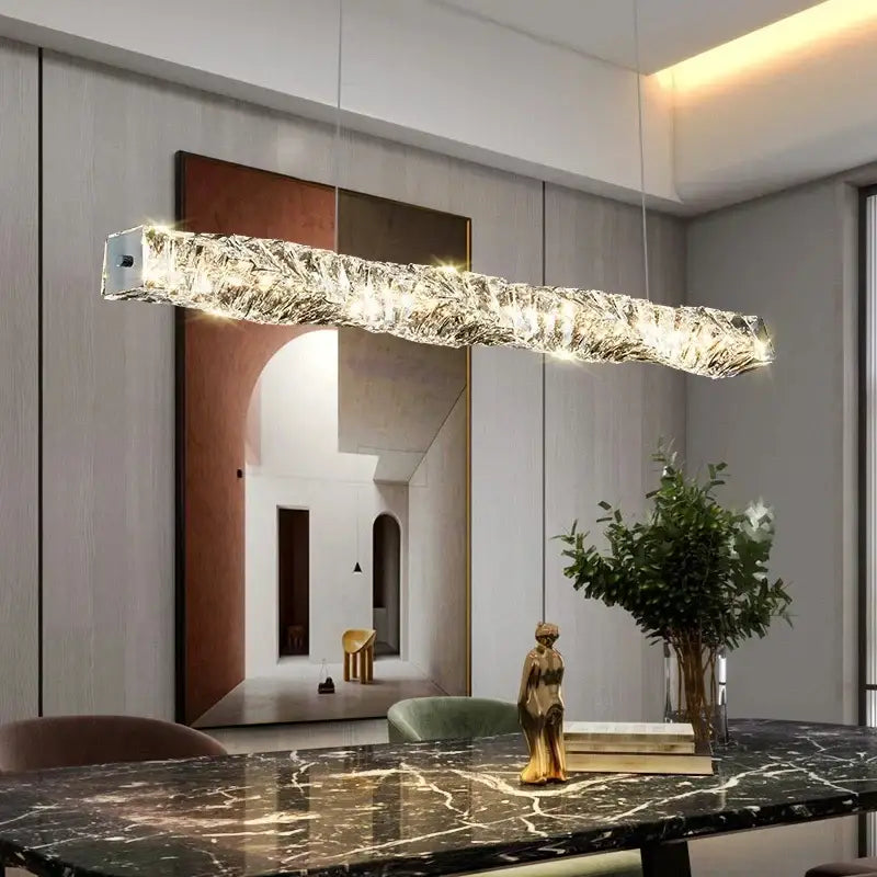 Modern rectangular elegant crystal pendant light with textured crystal and metallic finish for dining room decorbites elegant crystal pendant