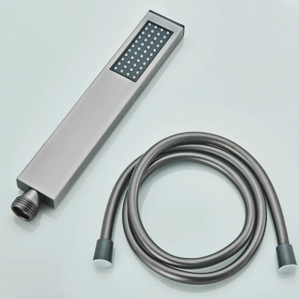 Modern rectangular handshower head with matte finish and stainless steel hose featuring a grid of water nozzles decorbites handshower head