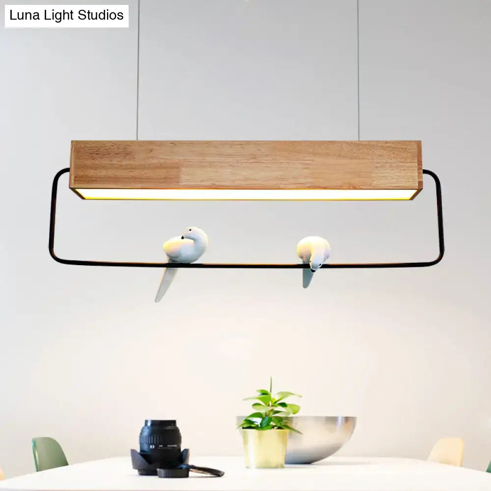 DecorBites modern rectangular wood pendant light with black metal frame and ceramic bird accents for dining room ceiling