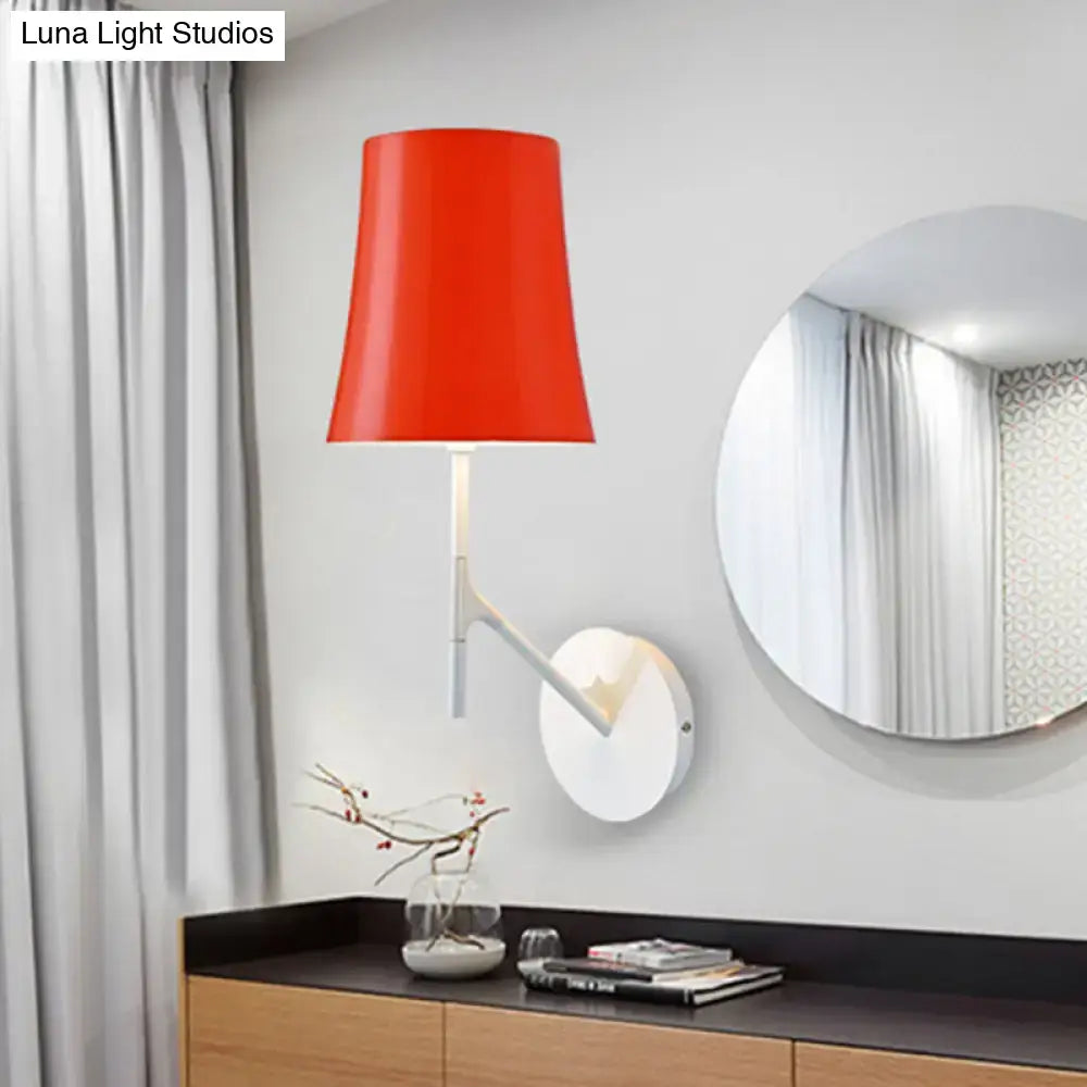 Modern red and white barrel wall mount sconce with vibrant red tapered lampshade and sleek metallic sconce design