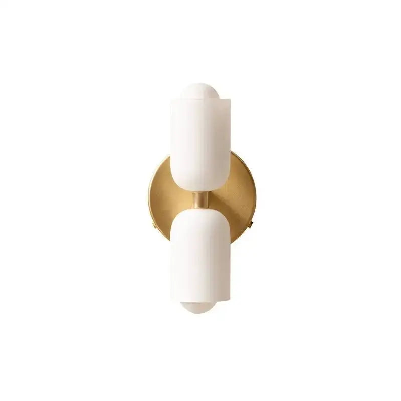 Modern red and white double head glass wall light with frosted shades and brushed brass backplate for bedroom use