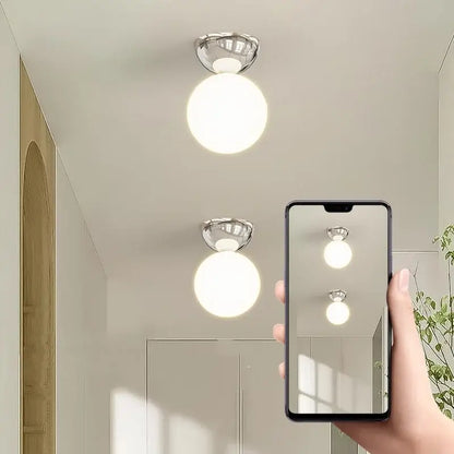 Modern chrome-finished iron glass led ceiling lights with spherical frosted glass globe for bedroom decorbites iron glass