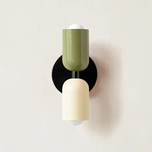 Olive green and cream cylindrical led wall lamp with black base for modern bedroom and living room decor