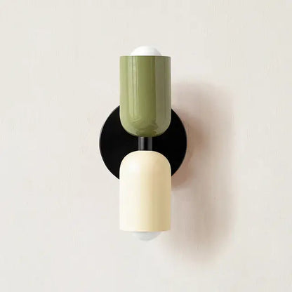 Olive green and cream cylindrical led wall lamp with black base for modern bedroom and living room decor