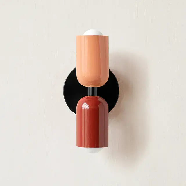 Modern red and black glossy led wall lamp with matte peach and terracotta two-toned design for bedroom decor