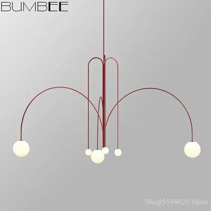 Bumbee decorbites designer line chandelier with sleek red metal frame and frosted glass globes for living room lighting